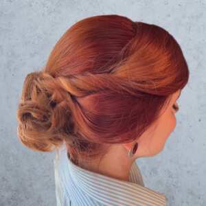 rose/red hair curled updo